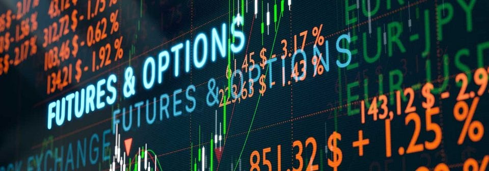 Stock market screen with future and options in glowing blue letters surrounded by numbers and currency abbreviations