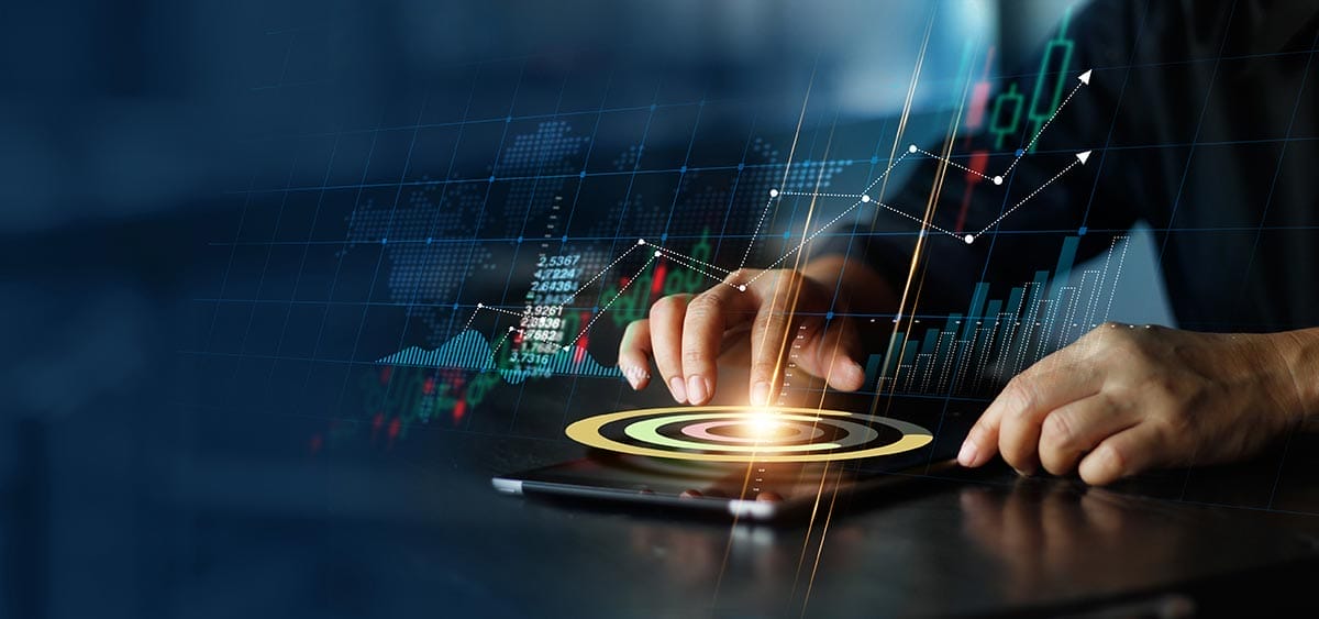 Concept of a Forex day trader touching an interactive gold pie chart from tablet screen