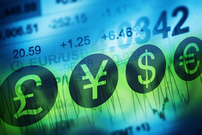 Image of currency symbols and conversions in background for Forex traders