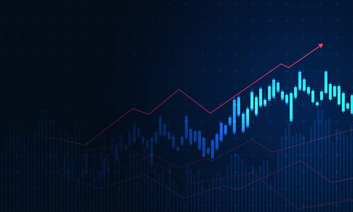 Image of stock market graph with red arrow showing upward market trend 