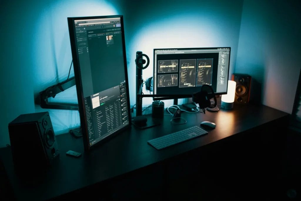 Trading environment set up with horizontal and vertical monitor.