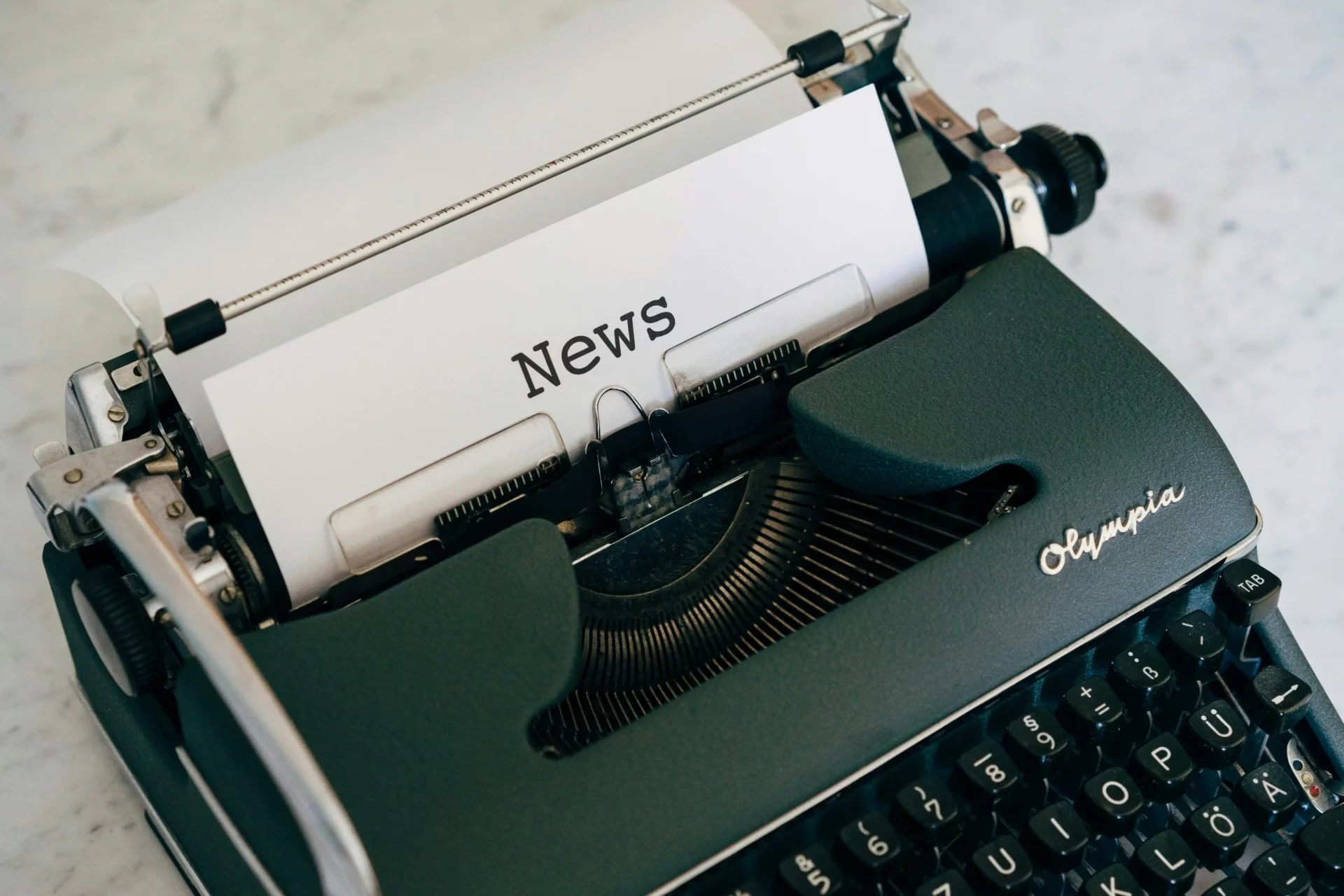 News Typwriter representing NFP (Non-Farms Payroll) news
