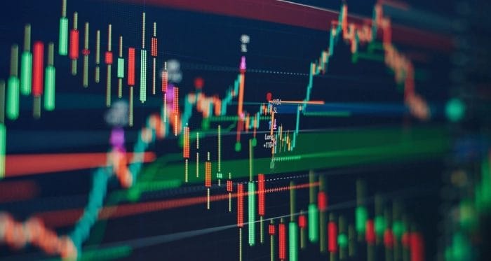 An abstract image showing a variety of Forex graphs and charts.